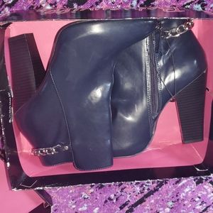 Betseyville Ankle bootie with silver chain accents